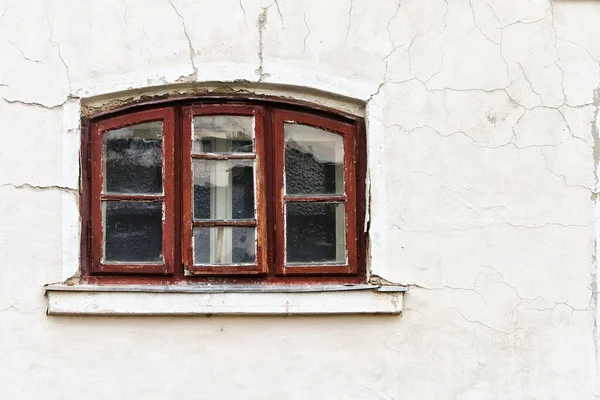 Old broken window, urban background 