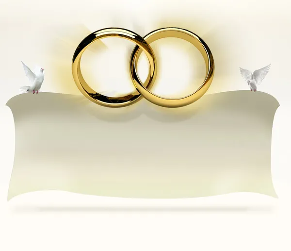 Wedding rings with invitation card carried by doves — Stock Photo, Image