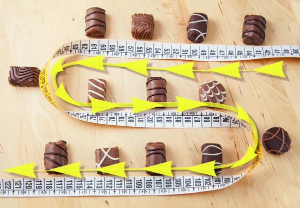 Chocolates - counting calories — Stock Photo, Image