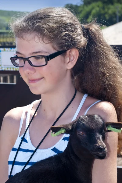 Girl with goat — Stok fotoğraf