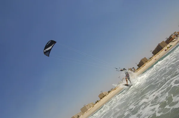 Kiteboarding on  a Mediterranean sea coast — Stock Photo, Image