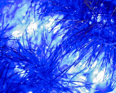 Işıl ışıl parlak mavi arkaplan ve parlak çelenk