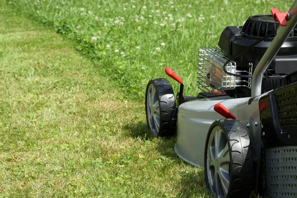 Silver lawn mower. Stock Image