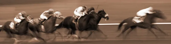 Abstracte bewegingsonscherpte rennen paarden Stockfoto