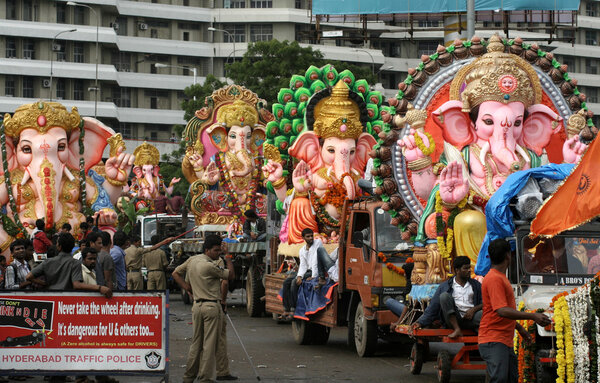 Ganesha idols are being transported for immersion