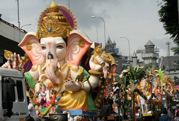 Ganesha idols are being transported for immersion