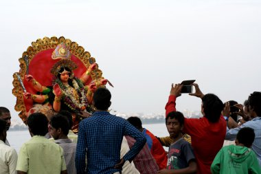 Hindu devotees perform puja clipart