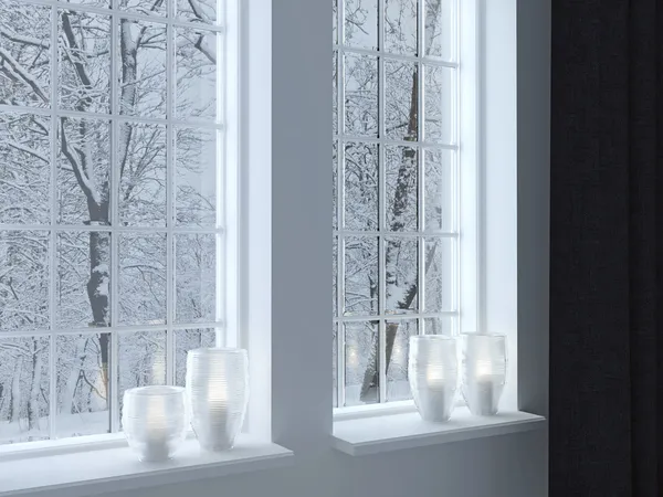 Candelabros en un alféizar de ventana . — Foto de Stock