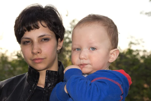 Portrait of the girl with the son on the nature — Stock Photo, Image