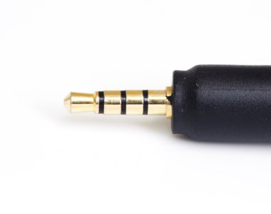 Beyaz arka plan üzerinde izole tel rulo ile mini jak