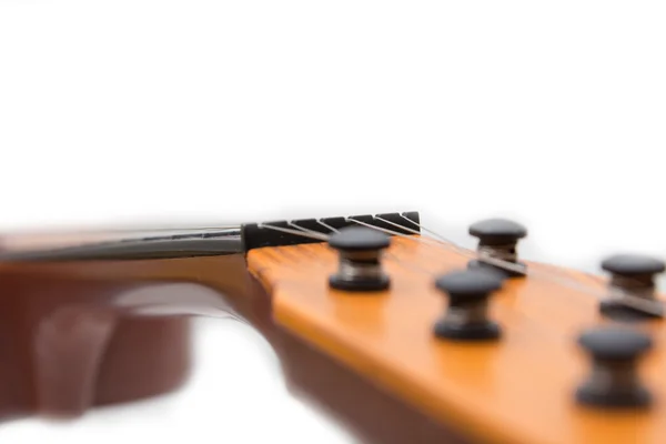 Headstock of the guitar over white background — Stock Photo, Image