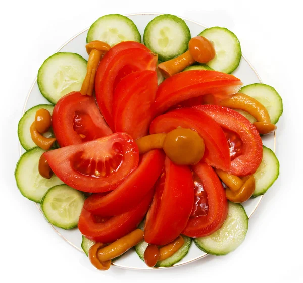 A salad of tomatoes, mushrooms and cucumbers — Stock Photo, Image