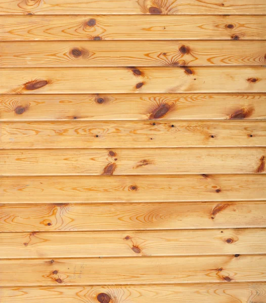 Piece of new wooden yellow fence — Stock Photo, Image