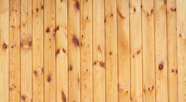 Piece of new wooden yellow fence — Stock Photo, Image