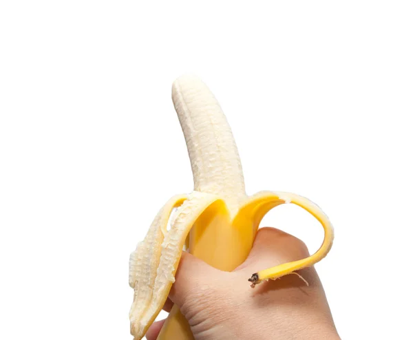 Banana madura na mão sobre fundo branco — Fotografia de Stock