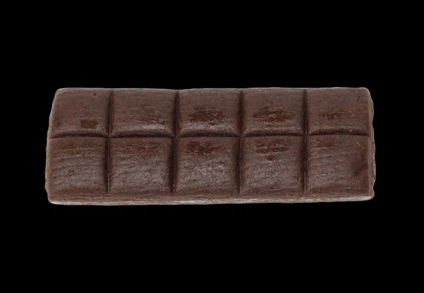 Barra de chocolate hematógeno isolado em preto — Fotografia de Stock