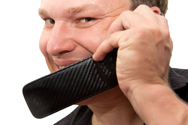 Uomo con telefono su sfondo bianco — Foto Stock