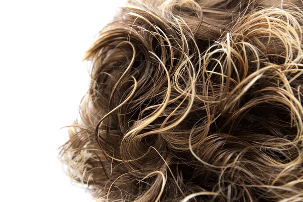 Brunette with curly hair on white background — Stock Photo, Image