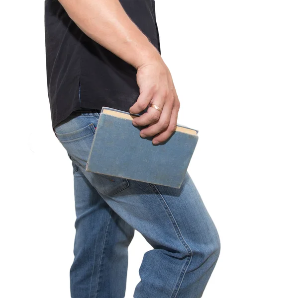 Homem segurando um livro em um fundo branco — Fotografia de Stock