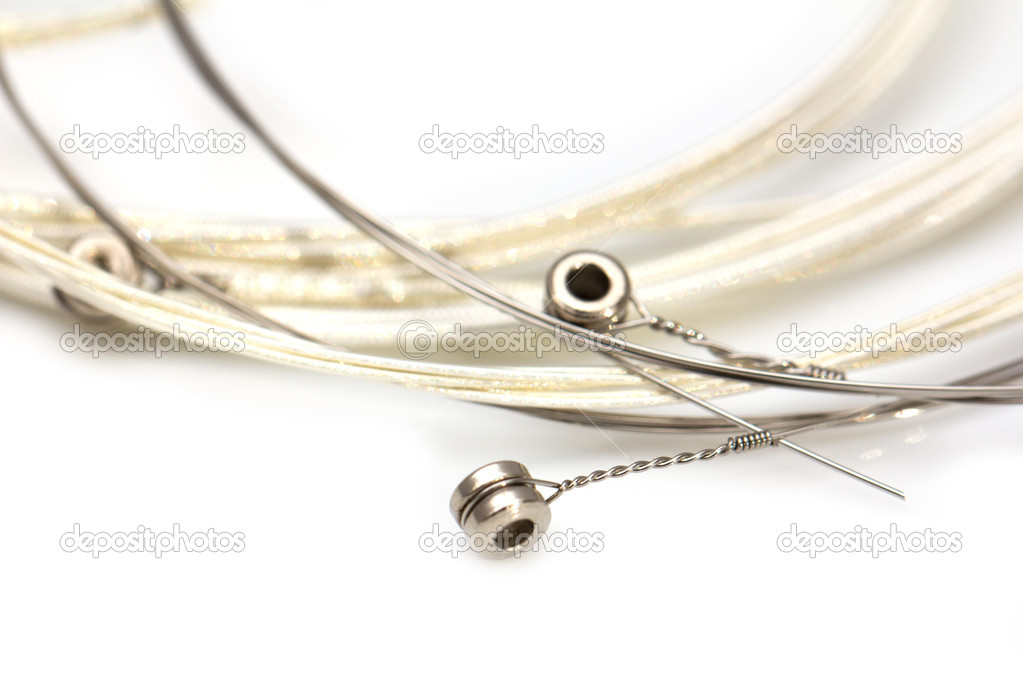 new string from a guitar on a white background. macro