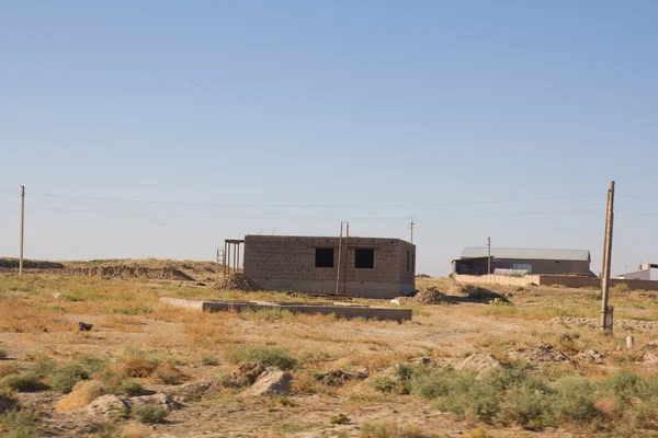 Maison en brique dans les steppes du Kazakhstan — Photo