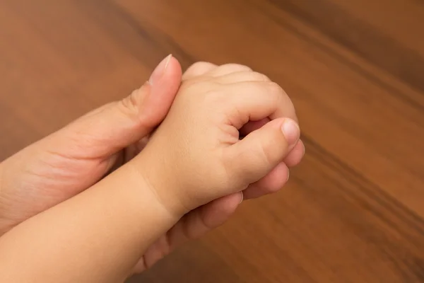 Hands mother and son — Stock Photo, Image