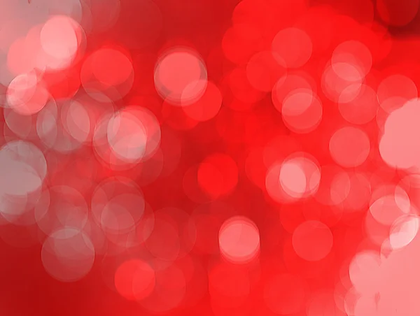 Festive red background bokeh of glare — Stock Photo, Image