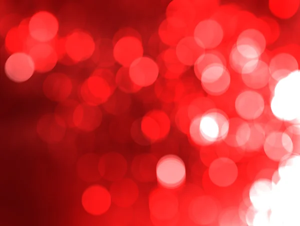 Festive red background bokeh of glare — Stock Photo, Image