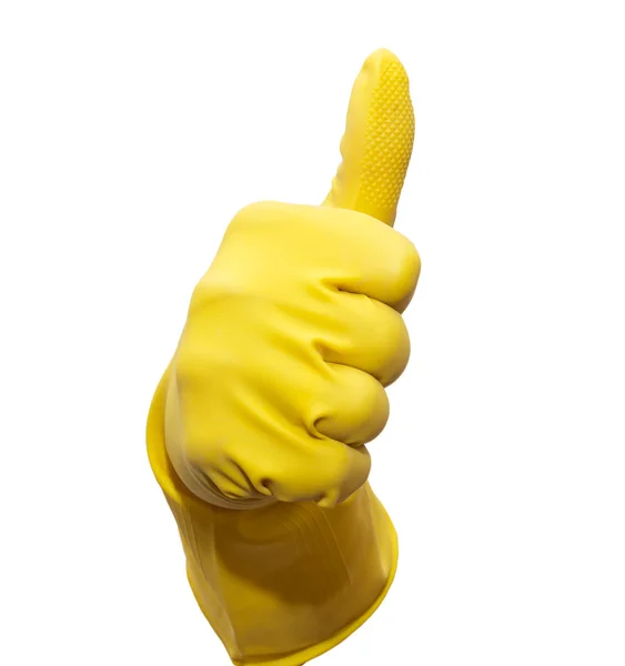 Αντίχειρα επάνω σε κίτρινο καουτσούκ γάντι — Φωτογραφία Αρχείου