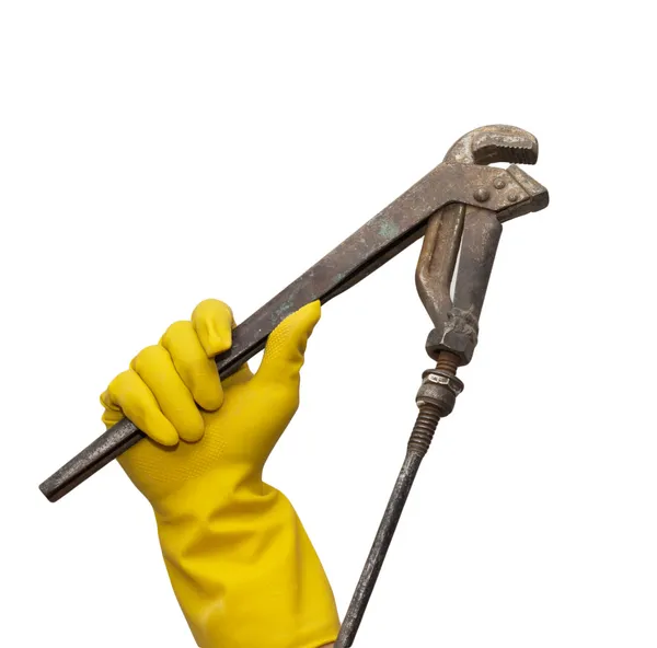 Wrench in yellow rubber gloves on white background — Stock Photo, Image