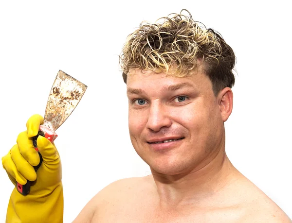 Spatula in the men's hands on a white background — Stock Photo, Image