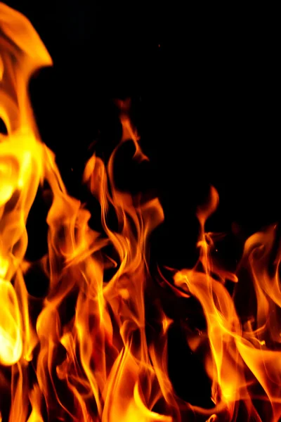 Fire flames on a black background — Stock Photo, Image