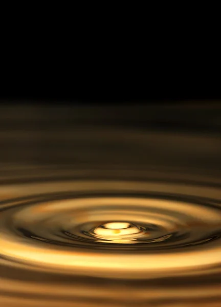 Sfondo di bella acqua dorata. macro — Foto Stock