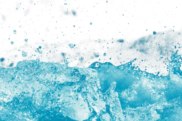 Water spray uit de golven — Stockfoto