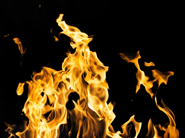 Feuer auf schwarzem Hintergrund — Stockfoto