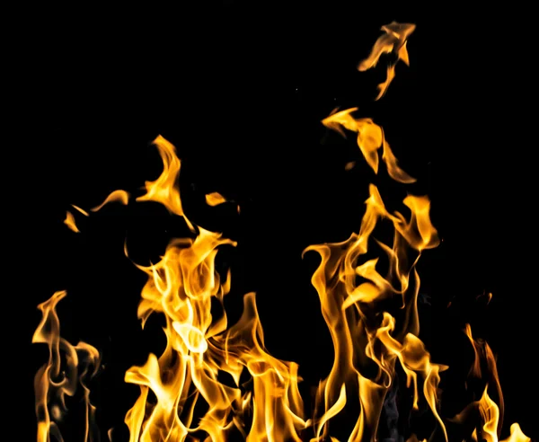 Feuer auf schwarzem Hintergrund — Stockfoto