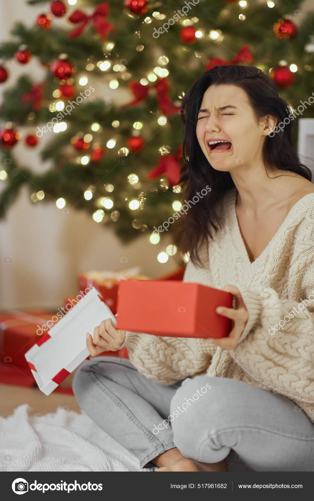 Bad Christmas Gift Disappointed and Unhappy Woman with Opened