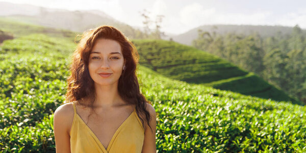Woman Traveler Portrait Against the Tea Plantations Background Royalty Free Stock Images