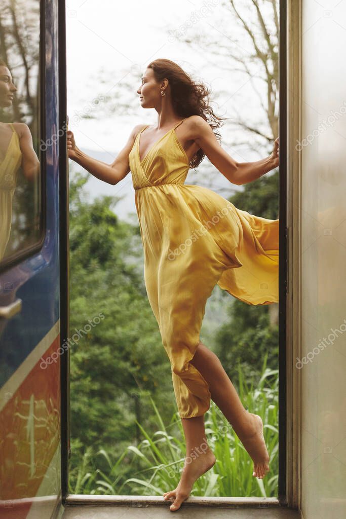 Travel and Exploration of Tourist Woman by Train to Famous Landmarks in Sri Lanka.