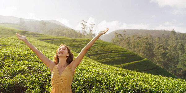 Carefree Woman Traveler Raised Hands Standing Natural Background Tea Plantations Stock Image