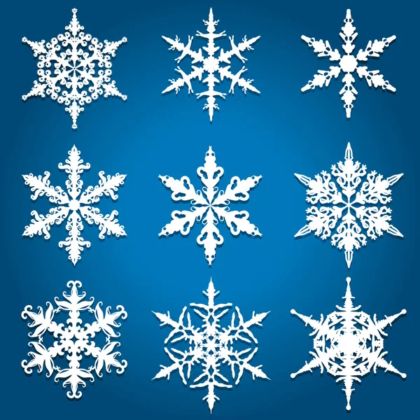 Wzory Bożego Narodzenia śnieżynka — Wektor stockowy