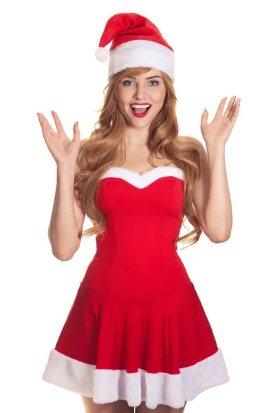 Surprised christmas woman wearing a santa hat smiling isolated o — Stock Photo, Image