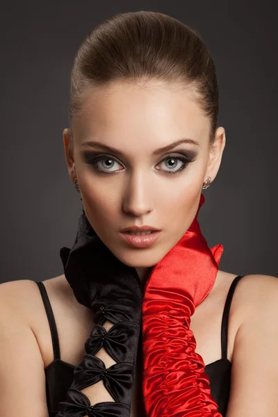 Fashion Portrait of a beautiful woman in gloves — Stock Photo, Image