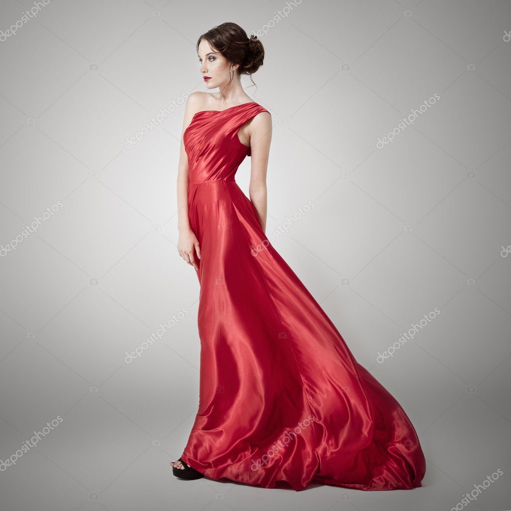 Young beauty woman in fluttering red dress. Stock Photo by ...