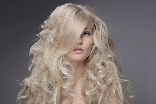 Beautiful Blond Woman. Curly Long Hair Stock Photo