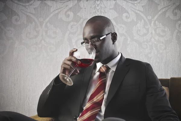 Black Businessman Drinking Wine — Stock Photo, Image