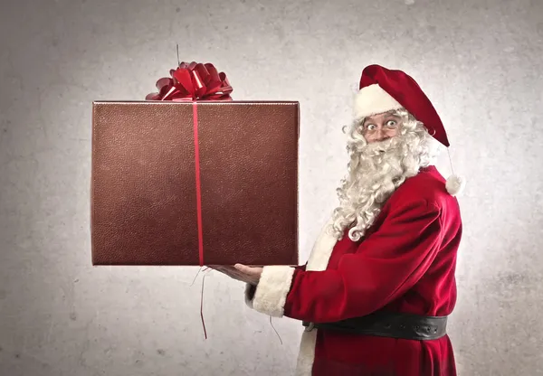 Santa claus velký dárek — Stock fotografie