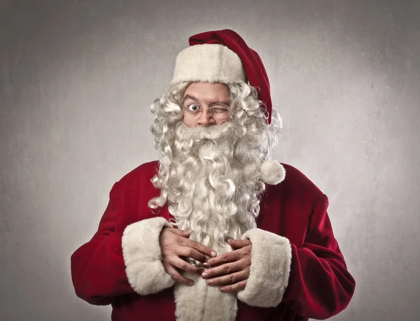 Подмигивающий Санта Клаус — стоковое фото