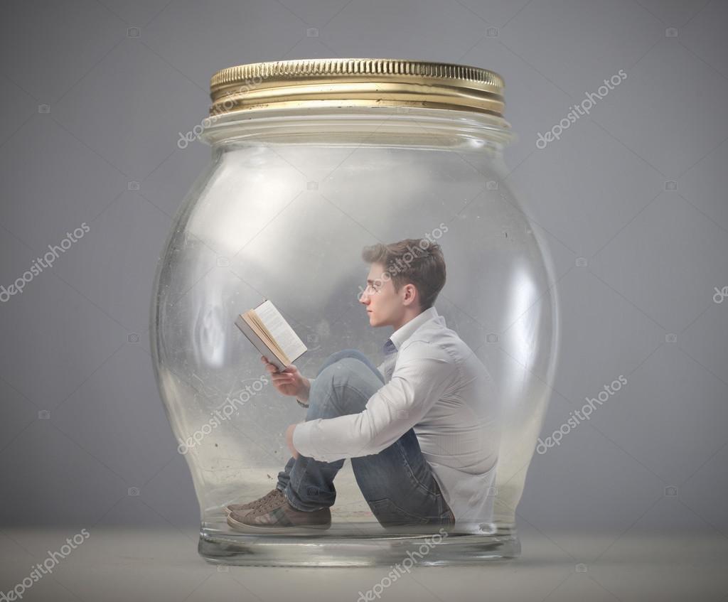 Guy Sits On Glass Jar