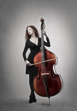woman playing contrabass clipart